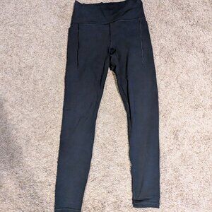Athleta Transcend Stash leggings Women size Medium